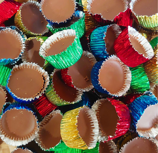 Chocolate Flavour Candy In A Coloured Foil Cup